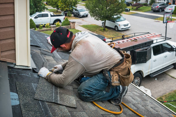 Professional Roofing technician working in Hicksville, NY